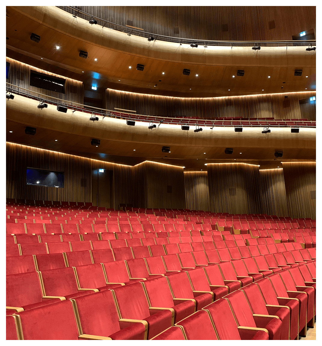Auditorium with acoustic panels installed